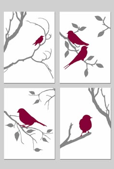 four red birds sitting on branches with leaves