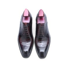 Step into luxury with these exquisite men's handmade Oxford shoes in rich burgundy crocodile leather.  Crafted with meticulous attention to detail, these shoes are the epitome of sophistication and style.  Perfect for the discerning gentleman who appreciates the finer things in life.


 #mensshoes #luxuryfootwear #oxfords #crocodileleather #handmade #menstyle Burgundy Oxford Shoes, Haiti