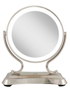 a round mirror sitting on top of a metal stand in front of a white background