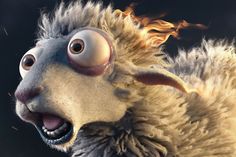 a close up of a sheep with fire coming out of it's eyes and mouth