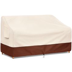 an outdoor furniture cover with brown trim