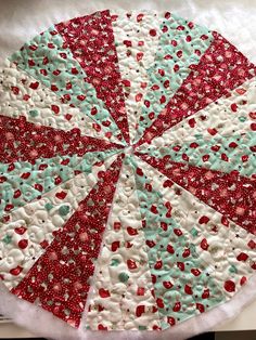 a close up of a piece of fabric with red and green sprinkles on it