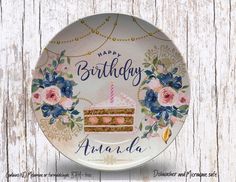 a birthday plate with a cake on it