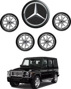 the mercedes benz logo and four wheel rims on a black car with chrome spokes