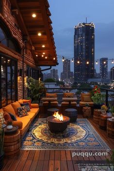 a fire pit sitting on top of a wooden floor next to a patio covered in furniture