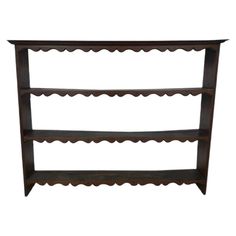 a wooden shelf with three tiers on the bottom and two shelves at the top