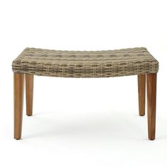 a bench made out of wood and wicker with an upholstered seat cushion