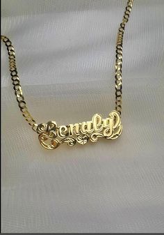 *Beautiful necklace Made in either 10k or 14k real solid gold, our double nameplates are personalized and made to order. Cuban link chain is 100% solid 10k or 14k gold heavyweight necklace. *Cuban link necklace weight approximately: 6-10 grams *Double name charm size approximately: 1.5"x1/5"inches (7 LETTERS MAX) -how to order: Select: DOUBLE NAME CHARM ONLY OR WITH 3MM NECKLACE SIZE. *3mm necklace size available: 14in,16in,18in,20in,22in,24inches. *Shipping:2-4 days  *Labor:1-5 days -Note: up t Silver Name Plate Necklace, Silver 14k Gold Name Necklace For Anniversary, Customizable 14k Gold Necklaces For Anniversary Gift, Customizable 14k Gold Name Necklace For Anniversary, Personalized Gold Necklace For Anniversary, Personalized Gold Necklace For Anniversary Gift, Customized Nameplate Jewelry For Anniversary Gift, Custom Gold Name Necklace For Anniversary, 14k Gold Custom Name Necklace For Anniversary