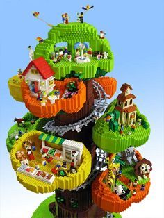 the lego tree is made up of many different types of buildings and people in it