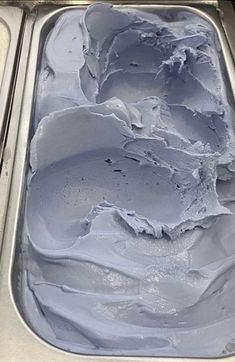 an ice cream dish with white icing in it