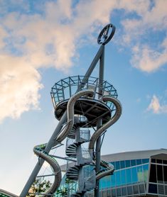 a tall metal structure with a spiral staircase