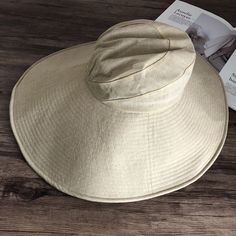 Introducing our Elegant Japanese-Inspired Extra Large Brim UV Protection Sun Hat, the perfect blend of style and functionality. Designed to provide maximum sun protection while maintaining a chic and sophisticated look, this hat is an essential accessory for any outdoor occasion. High-Quality Material: Made from premium linen for durability and breathability. Extra Large Brim: Front brim measures approximately 14.5 cm, back brim approximately 18.5 cm. 360-Degree Sun Protection: Provides full cov Lightweight Solid Sun Hat With Uv Protection, Solid Brimmed Sun Hat With Uv Protection, Beige Panama Hat For Outdoor, Lightweight Solid Bucket Hat With Uv Protection, Lightweight Sun Hat With Flat Brim, Lightweight Flat Brim Sun Hat, Lightweight Solid Color Sun Hat With Flat Brim, Lightweight Solid Color Sun Hat For Summer, Lightweight Curved Brim Beach Hat