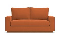 an orange couch sitting on top of a white floor