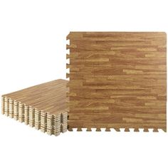 the wooden flooring tiles are made from different types of wood and have been assembled together