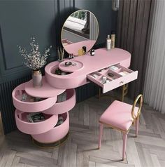 a pink vanity table with two stools and a mirror on the wall next to it