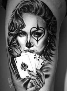 a woman with makeup and playing cards on her thigh