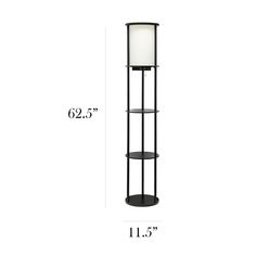 the floor lamp is tall and has a white light on it's side, next to a black stand