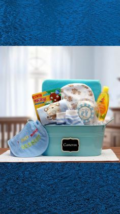 Celebrate the arrival of a beautiful baby with a generously filled, Baby Basics Gift Pail Blue hamper. It overflows with a collection of selected baby necessities that any new parent will love. The adorable gift basket makes for great storage in babies room after the gift is used. Our each and every gift basket is hand crafted, hand wrapped in cellophane and created when you place your order to become a one of a kind creation. New Baby Gift Basket Boy, Baby Boy Gift Baskets Simply Unique Baby Gifts, Newborn Baby Gift Basket, New Baby Gift Basket, Boy Gift Basket, Baby Boy Gift Baskets, Baby Gift Baskets, Baby Receiving Blankets, Babies Room