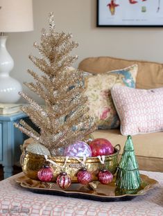 a christmas tree in a basket on a table