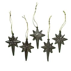 three metal star ornaments hanging from string