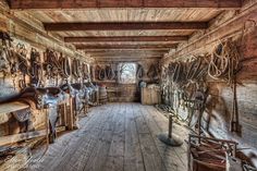 an old wooden room with lots of tools