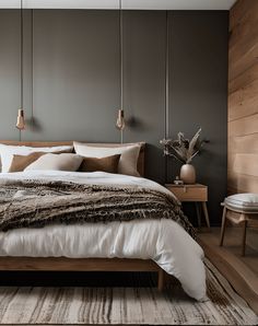 a large bed sitting in a bedroom on top of a wooden floor