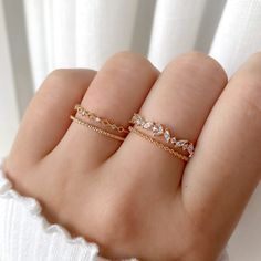 This lovely ring centers on an eye-catching round crystal, finished with marquise crystals and a beaded pattern band. Type: Adjustable ring (approx. size 6) Main material: Rose Gold, Rhodium, 16k Gold Plated on Brass,  Cubic Zirconia Need some jewelry inspiration? Follow us on Instagram  @statementGrey Korean Rings, Minimal Rings, Kacamata Fashion, Hand Jewelry Rings, Minimalistic Jewelry, Elegant Rings, Inexpensive Jewelry, Gold Rings Fashion, Gold Ring Designs