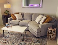 a living room with a couch and coffee table