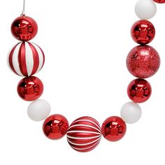 a red and white necklace with ornaments on it