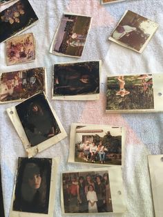 many old photos are displayed on a blanket