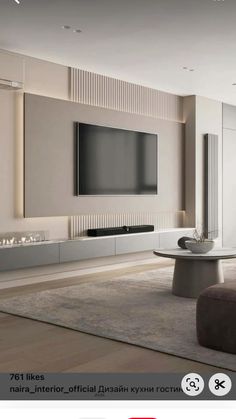 an image of a living room setting with tv and couches on the wall in front of it