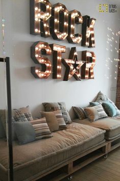 a living room filled with furniture and lots of lights