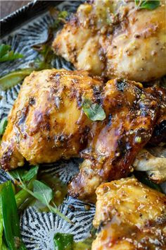 grilled chicken with herbs on a plate