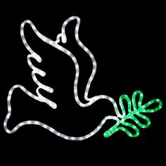 a light up dove with a green twig on it's side, against a black background