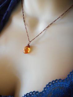 "This necklace is made with a gorgeous topaz colored Czech glass teardrop measuring 12mm W x 16mm L and is hung on an 17-19\" antique copper chain, or black cord, your choice! This piece has a beautiful golden glow, it really pops and is perfect for Fall! Length is 16\" -18\" Length of chain or cord can be changed as requested but if no notes to seller are made the default will be measurements as above. Your necklace will come in a cute organza pouch or our signature gift box all ready for gift Amber Jewelry Necklaces, Topaz Jewelry November, Fall Necklace, Autumn Necklace, Birthday Necklace, November Birthday, Organza Pouch, Golden Necklace, Topaz Jewelry