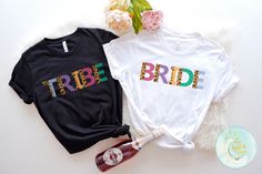 two t - shirts with the word babe and bride printed on them next to flowers