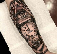 a man's arm with an all seeing clock and rose tattoo design on it