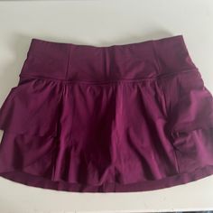 Great Condition! Never Been Worn Athletic Mini Skirt From Athleta Size S First Ys 4-6 Sports Mini Skirt With Built-in Shorts, High Waist Stretch Mini Skirt For Sports, Solid Color Workout Skirt With Elastic Waistband, Solid Workout Skirt With Elastic Waistband, Stretch Mini Skirt Activewear, Purple Skort With Built-in Shorts, Stretch Skirted Workout Bottoms, Sports Mini Skirt With Pockets, Sports Mini Skort With Elastic Waistband