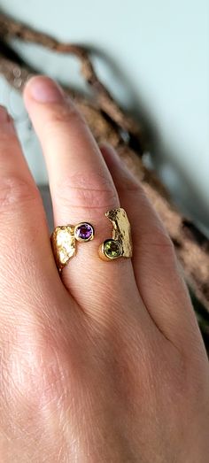 Amethyst & Peridot Gold Faerie Tale Ring | Caroline Stokesberry-Lee Jewellery Design Peridot Gold Jewelry, Special Rings Design, Amethyst And Peridot Ring, Gold Gemstone Rings In Recycled Gold, Gold Rings With Gemstone In Recycled Gold, Modern Gold Multi-stone Gemstones, Luxury Peridot Rings With Accent Stones, Gold Gemstones Ring With Gemstone Accents, Luxury Yellow Gold Peridot Jewelry