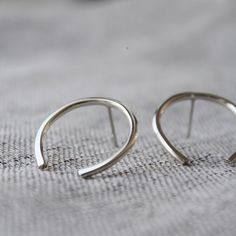 Striking & minimal – these large open circle studs float effortlessly on your earlobes.— d e t a i l s —-arc studs measure roughly 2.5cm tall-hand forged out of solid sterling silver-mirror finish-All Lola&Cash jewellery will arrive in gift giving mode!>>>——————————<<<>>>——————————<< Minimal Silver Earrings, Minimalist Open Circle Hoop Earrings For Everyday, Minimalist Semi-circle Hoop Earrings As Gift, Minimalist Semi-circle Hoop Earrings For Gift, Minimalist Open Circle Hoop Earrings, Silver Minimalist Hoop Earrings, Cute Ear Piercings, 18k Gold Earrings, Silver Mirror