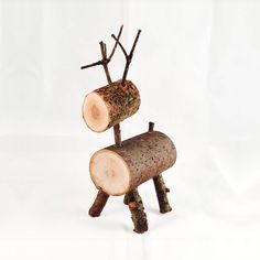 a piece of wood that has been made to look like a reindeer