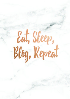 the words eat, sleep, and blog repeat in gold lettering on a white marble background