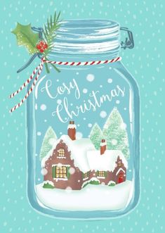 a mason jar filled with snow covered houses