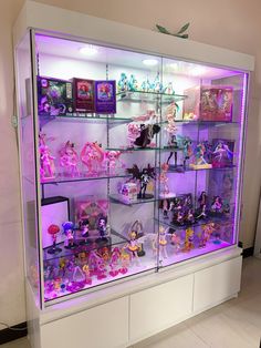 a display case filled with lots of toys