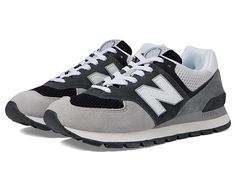 New Balance Classics 574D Rugged - Men's Shoes : Black/Grey : Retro-inspired style meets modern comfort with the New Balance Classics 574D Rugged sneaker, elevated in bold, varsity colorways. Low-top sneaker silhouette with full-lace closure. Leather and textile mesh upper with triple-stacked N logo. Padded collar and tongue for secure fit. Breathable textile lining. Removable, cushioned textile insole. ENCAP midsole cushioning combines lightweight foam with a durable polyurethane rim. Durable r New Balance Mens Shoes, Sneaker Silhouette, Mens New Balance, New Balance Classics, New Balance Mens, N Logo, New Balance Black, Rugged Men, Mens Shoes Black