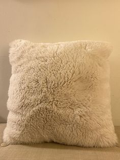 This decorative pillow is crafted from fine faux fur.  Luxury ultra soft fabric made in Italy.  Stylish and modern pillow that fit any setting.  Color is light cream/ ivory. Fabric is made from 80% Polyester, 20% Cotton. Double sided - same front and back.  The faux fur fabric is wonderfully smooth and acts as a great accessory to your bedding or sofa.  Optional cozy pillow insert is available. The comfy pillow insert is made from angel hair which is a silky, high quality polyester that is desig Comfy Pillow, Modern Pillow, Comfy Pillows, Ivory Fabric, Cozy Pillow, Angel Hair, Fur Fabric, Modern Pillows, Faux Fur Fabric