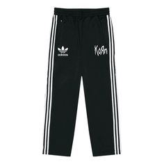 adidas x KORN Track Pants 'Black' IN9110 Relaxed Fit Streetwear Bottoms With Three Stripes, Relaxed Fit Bottoms With Three Stripes For Streetwear, Adidas Relaxed Fit Pants, Adidas Relaxed Fit Pants With Logo, Adidas Athleisure Pants For Streetwear, Adidas Logo Sweatpants For Streetwear, Adidas Sportswear Sweatpants For Streetwear, Adidas Sweatpants For Streetwear, Athleisure Streetwear Pants With Three Stripes