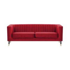 a red velvet couch with gold legs