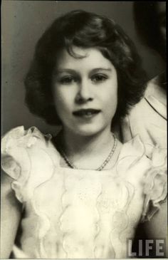 an old black and white photo of a woman