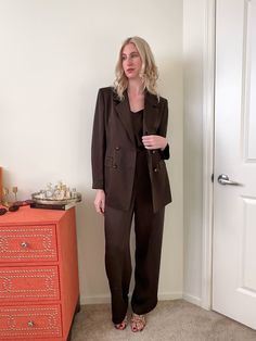 Beautifully made 90's chocolate brown satin suit set.  This set purchased from the private collection of an Italian fashion model in Florence, Italy. The fabric drapes beautifully, and is a rich warm brown.  This is being sold only as a full set, cannot be purchased as individual pieces.  Suit would fit a modern size Small/Medium depending on desired fit. Please check measurements below. If you have any concerns on sizing, please message me! Garment Measurements: Jacket Bust: 39in / 99cm Arm Length: 24in / 61cm Lenth: 29in / 74cm Top Bust: 38in / 96.5cm Waist: 34.5in / 88cm Lenth: 23in / 58.5cm Pant Waist: 31in / 79cm Hip: 37in / 94cm Inseam: 32in / 81cm Model Measurements: Bust: 32 in / 81cm Waist: 27 in / 68.5cm Hip: 38 in / 96.5cm Height: 5'10 / 178cm Due to vintage nature, items will h Chocolate Brown Suit Women, Satin Suit Outfit, Satin Pant Suit, Chocolate Satin, Satin Pant, Satin Suit, Brown Suit, Blazer Top, Brown Suits